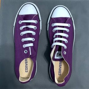 Brand new purple low top converse